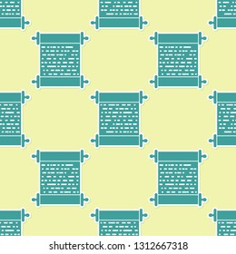 Green Paper scroll icon isolated seamless pattern on yellow background. Canvas scroll sign. Flat design. Vector Illustration