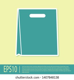 Green Paper shopping bag icon isolated on yellow background. Package sign. Vector Illustration