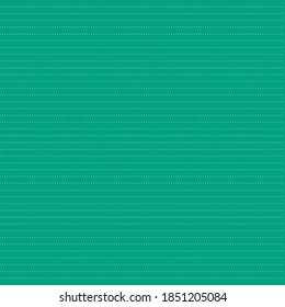 Green paper with white dotted lines
