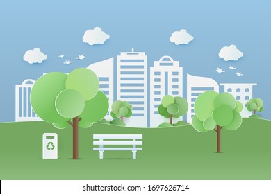 Green Park in Cityscape. exercise and relax. Green grass and tree in garden on cloud and blue sky background.
Paper art vector illustration