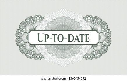 Green passport money rosette with text Up-to-date inside