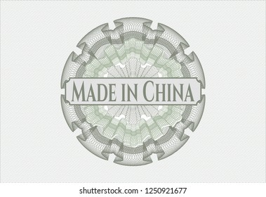 Green passport money rossete with text Made in China inside