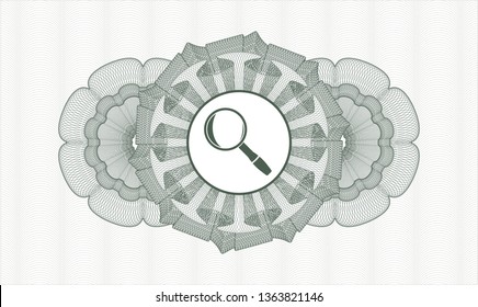 Green passport money style rosette with magnifying glass icon inside