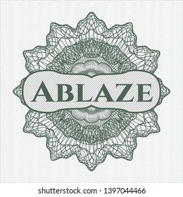 Green passport money style rosette with text Ablaze inside