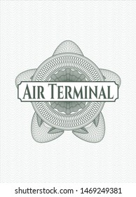 Green passport money style rosette with text Air Terminal inside