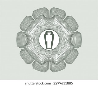 Green passport money style rosette. with dead man in his coffin icon inside