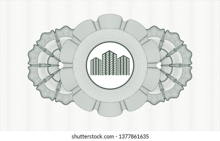 Green passport rosette with buildings icon inside