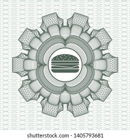 Green passport rosette with cheeseburger icon inside