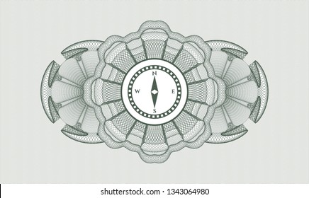 Green passport rosette with compass icon inside