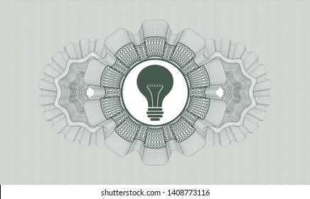 Green passport rosette with light bulb icon inside