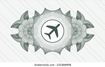Green passport rosette with plane icon inside