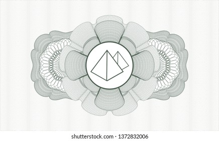 Green passport rosette with pyramids icon inside