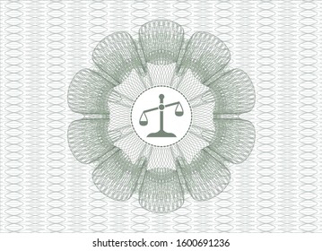 Green passport rosette with scale icon inside