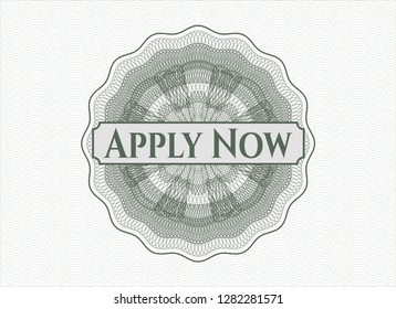 Green passport rosette with text Apply Now inside