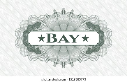 Green passport rosette with text Bay inside
