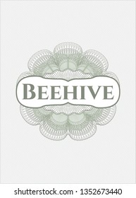 Green passport rosette with text Beehive inside