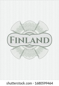 Green passport rosette with text Finland inside