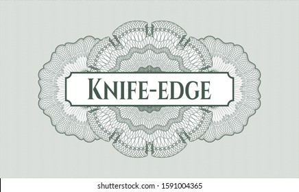 Green passport rosette with text Knife-edge inside
