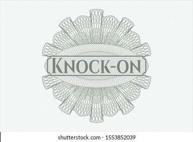 Green passport rosette with text Knock-on inside