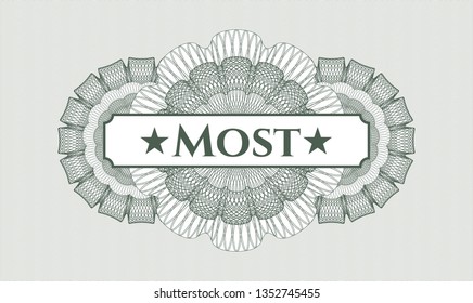Green passport rosette with text Most inside