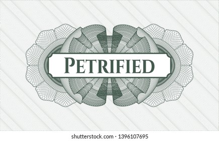Green passport rosette with text Petrified inside