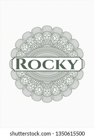 Green passport rosette with text Rocky inside