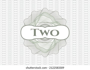 Green passport rosette with text Two inside