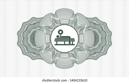 Green passport style rosette with bench press icon inside