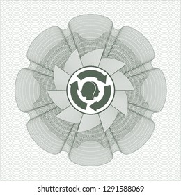 Green passport style rosette with brain storm icon inside