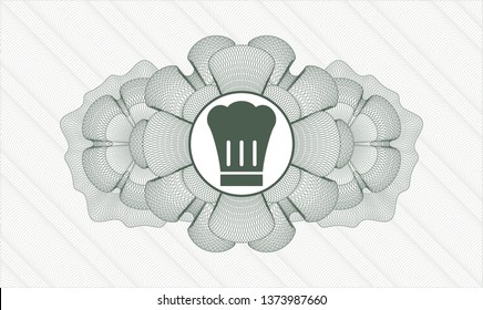 Green passport style rosette with chef hat icon inside