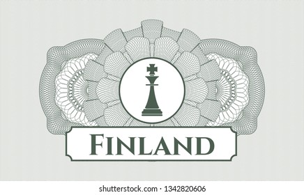 Green passport style rosette with chess king icon and Finland text inside