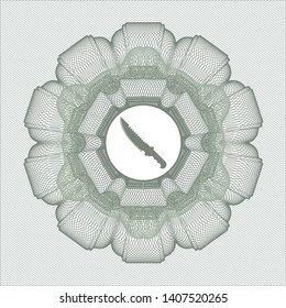Green passport style rosette with combat knife icon inside