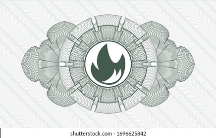 Rosette im grünen Reisepass mit Feuersymbol