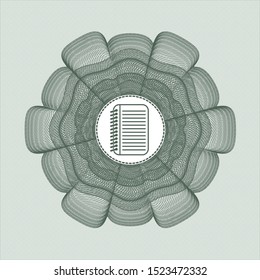 Green passport style rosette with note book icon inside