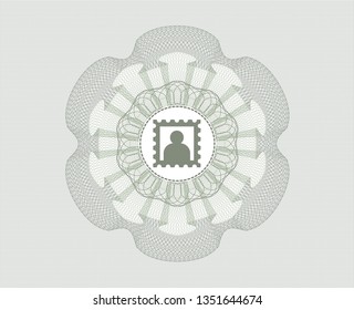 Green passport style rosette with picture icon inside