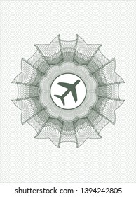 Green passport style rosette with plane icon inside