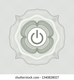 Green passport style rosette with power icon inside