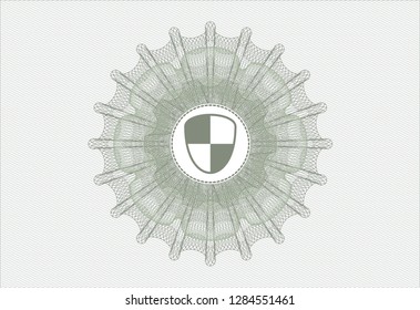 Green passport style rosette with shield, safety icon inside