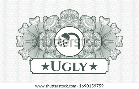 Green passport style rosette with shower icon and Ugly text inside