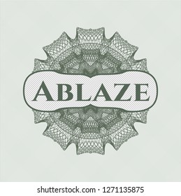 Green passport style rosette with text Ablaze inside