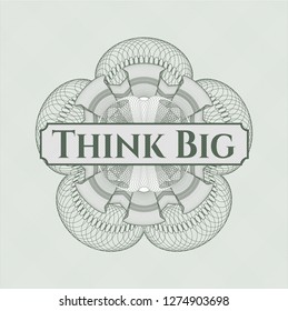 Green passport style rosette with text Think Big inside