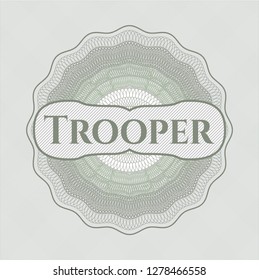Green passport style rosette with text Trooper inside
