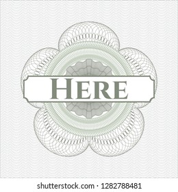 Green passport style rosette with text Here inside