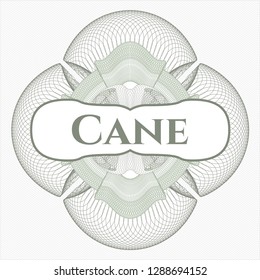 Green passport style rosette with text Cane inside