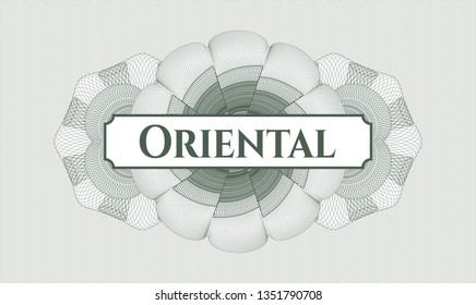 Green passport style rosette with text Oriental inside