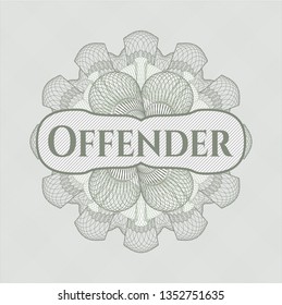 Green passport style rosette with text Offender inside