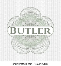 Green passport style rosette with text Butler inside