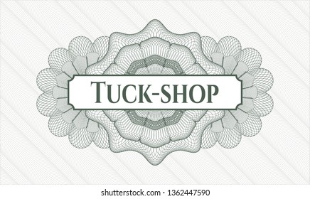 Green passport style rosette with text Tuck-shop inside