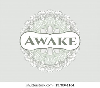 Green passport style rosette with text Awake inside
