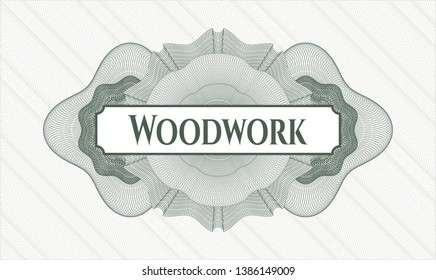 Green passport style rosette with text Woodwork inside